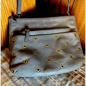 Fossil’s Gray Leather & Grommets & Laser Cut Hole Pattern Crossbody Bag